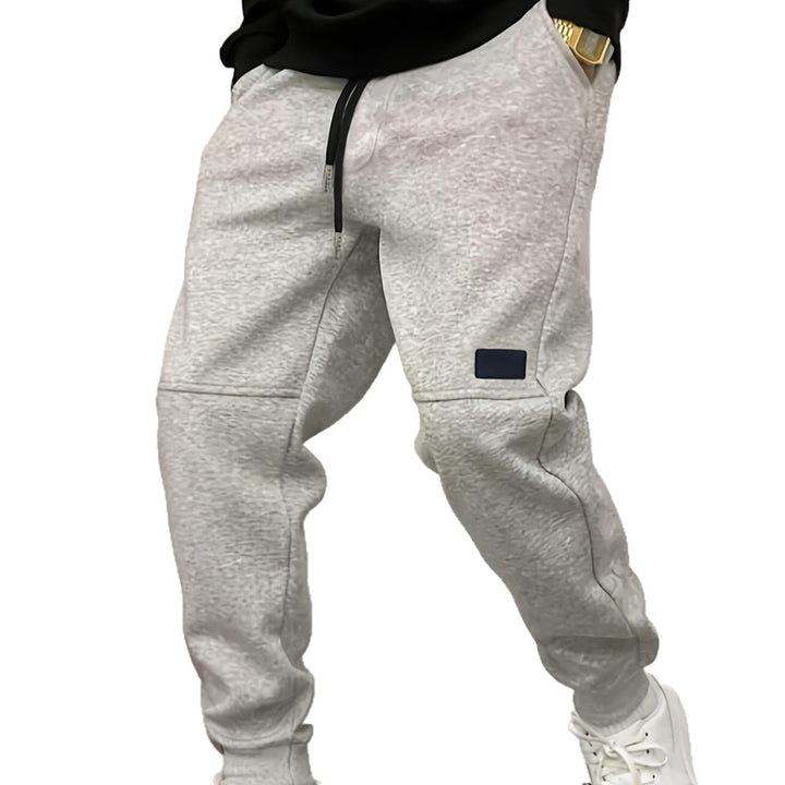 Men's sporty jogging pants with side zipper details Lisslune