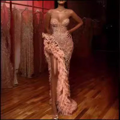 Women Figure-hugging Evening Dress with Shimmering Pearls and Ruffle Details