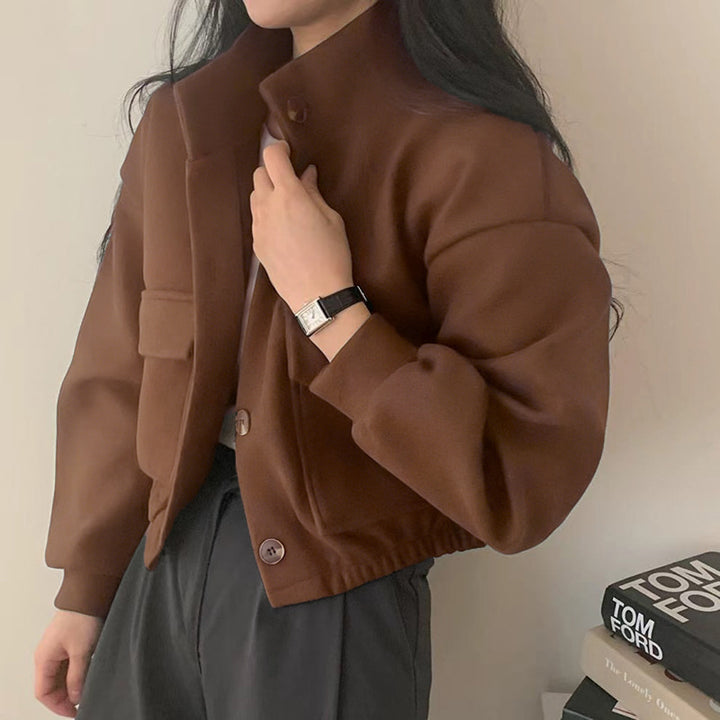 Women's cropped bomber jacket with voluminous sleeves and practical pockets