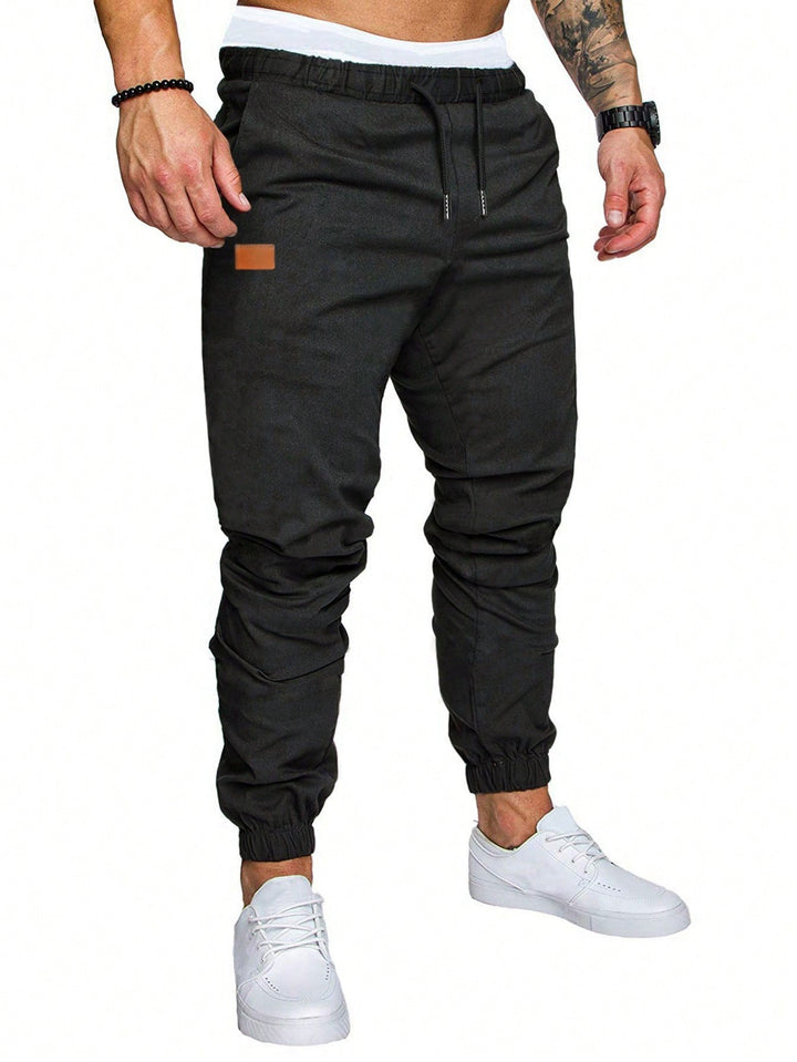 Men's casual jogging pants with elastic waistband and practical zip pockets Lisslune