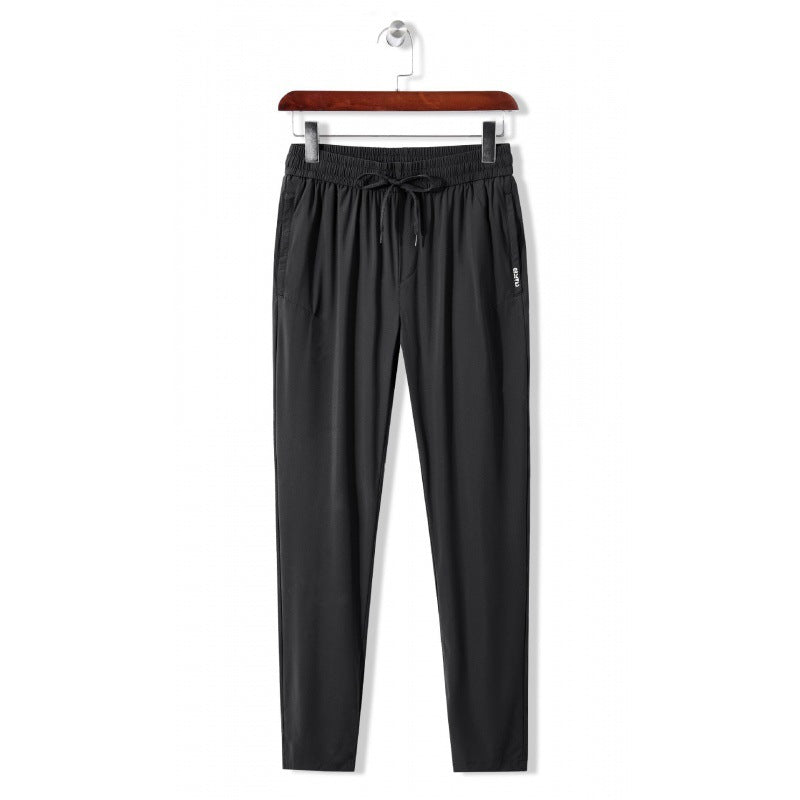 Men's casual sports pants with elastic waistband and practical side pockets Lisslune