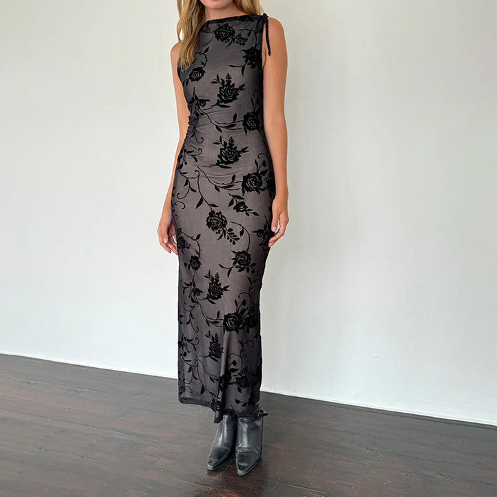 Women’s maxi dress with floral lace detailing and figure-hugging silhouette