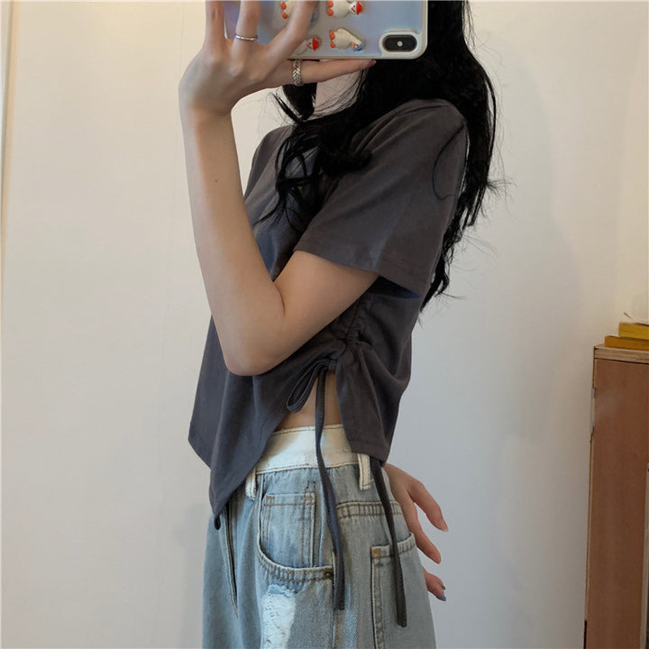 Women's crop top with asymmetric hem and loose fit