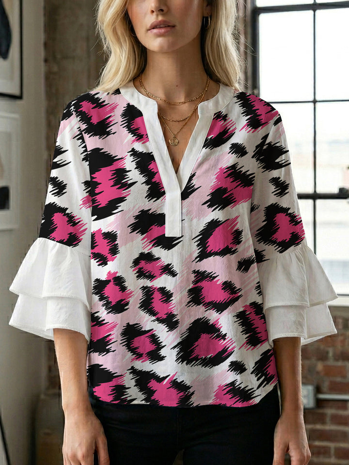 Women's blouse with ruffle details and eye-catching animal print Lisslune