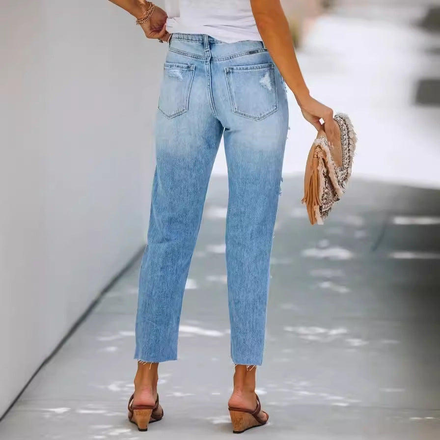 Women's destroyed jeans in a relaxed fit with fashionable details