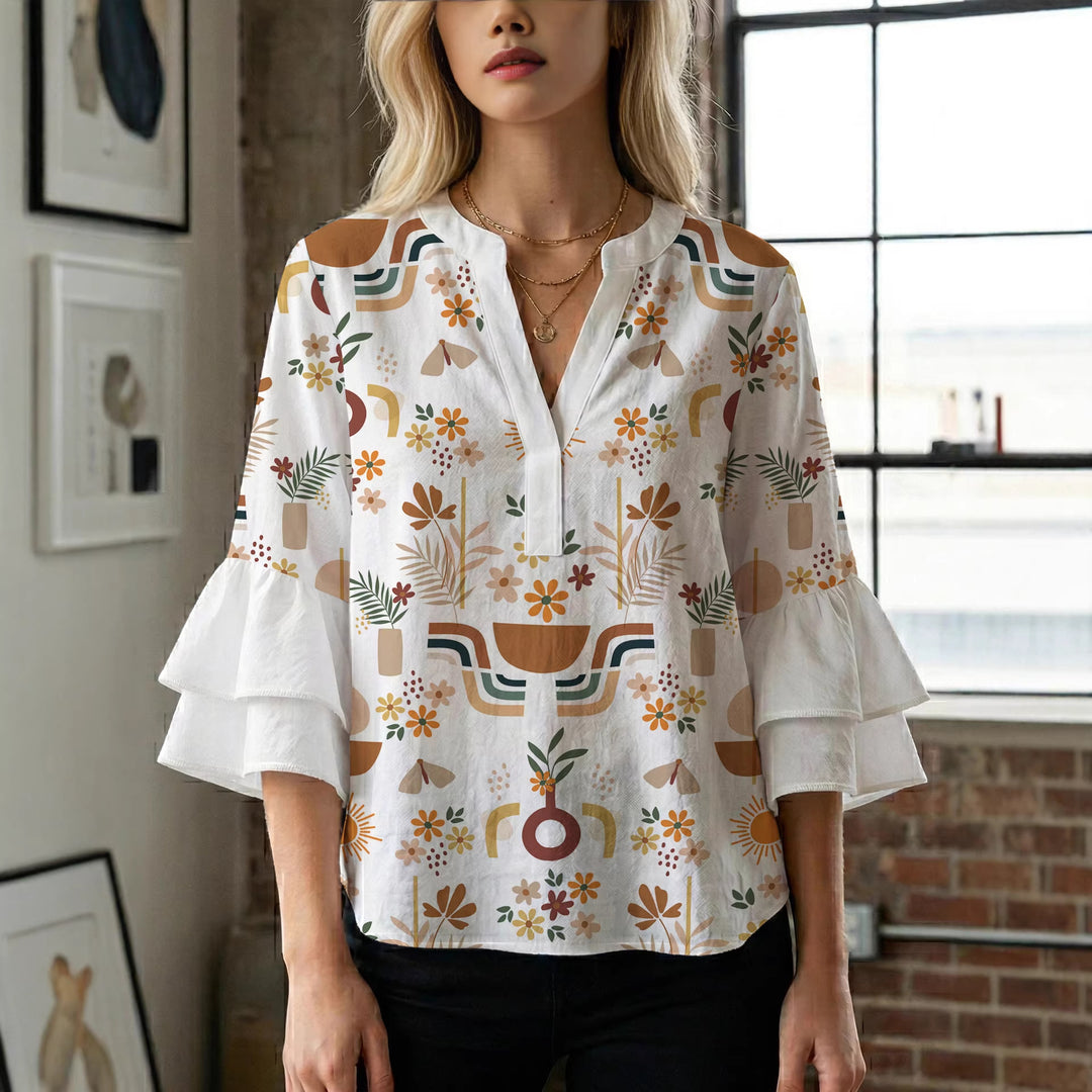 Women's blouse with ruffle details and eye-catching animal print Lisslune