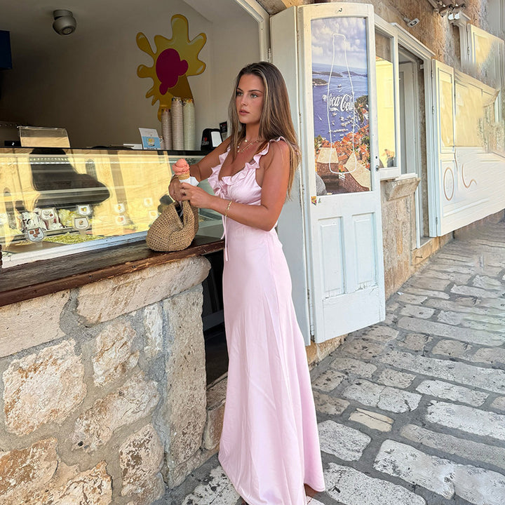 Women's maxi dress with fresh ruffle design and neckholder detail