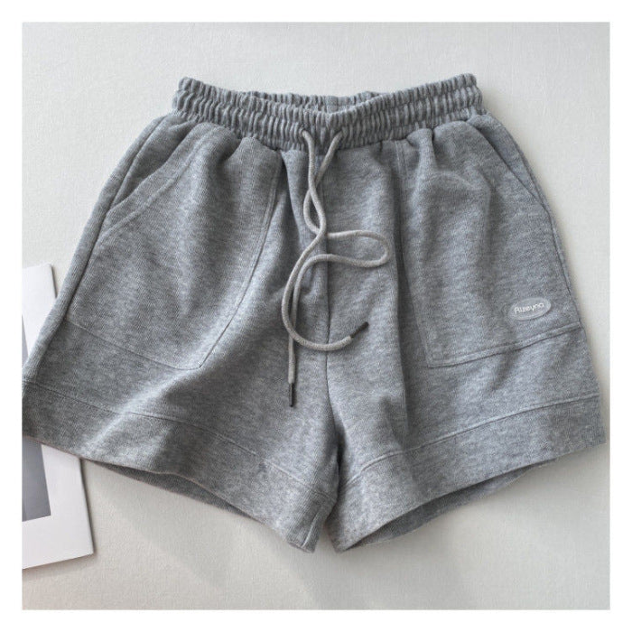 Women's casual jogging shorts with elastic waistband and practical side pockets