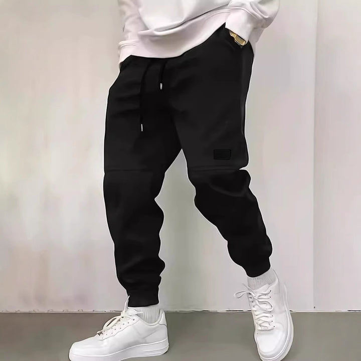 Men's sporty jogging pants with side zipper details Lisslune