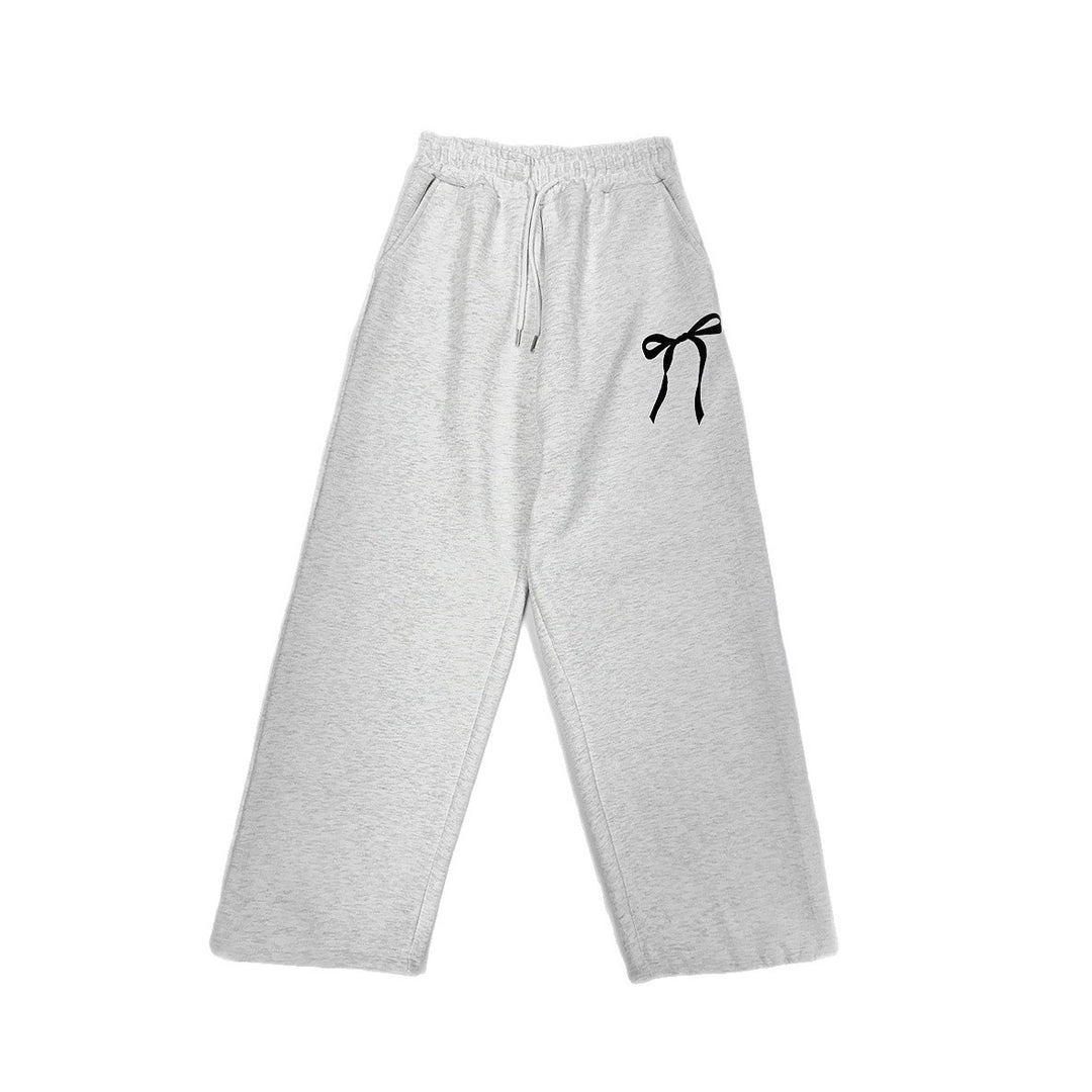 Women's loose leisure pants with elastic waistband and decorative bow motif Lisslune