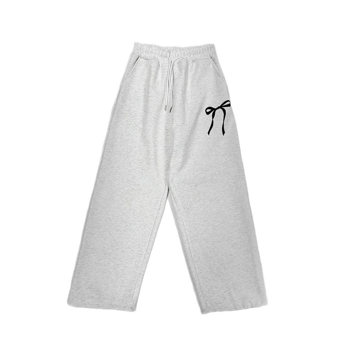 Women's loose leisure pants with elastic waistband and decorative bow motif Lisslune