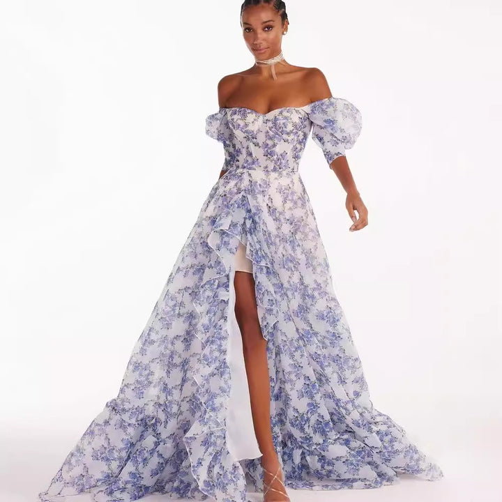 Women's festive maxi dress with off-shoulder design and floral ruffle details