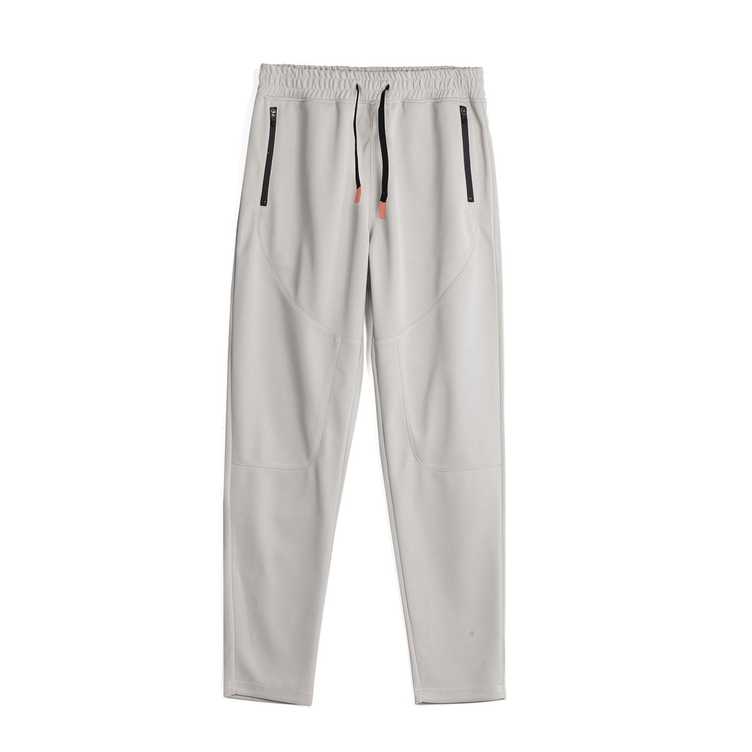 Men's sporty jogging pants with innovative breathable structure and practical zip pockets Lisslune