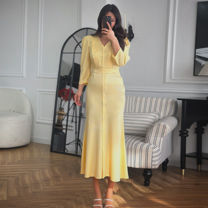 Women's maxi dress with button placket and elegant puff sleeves