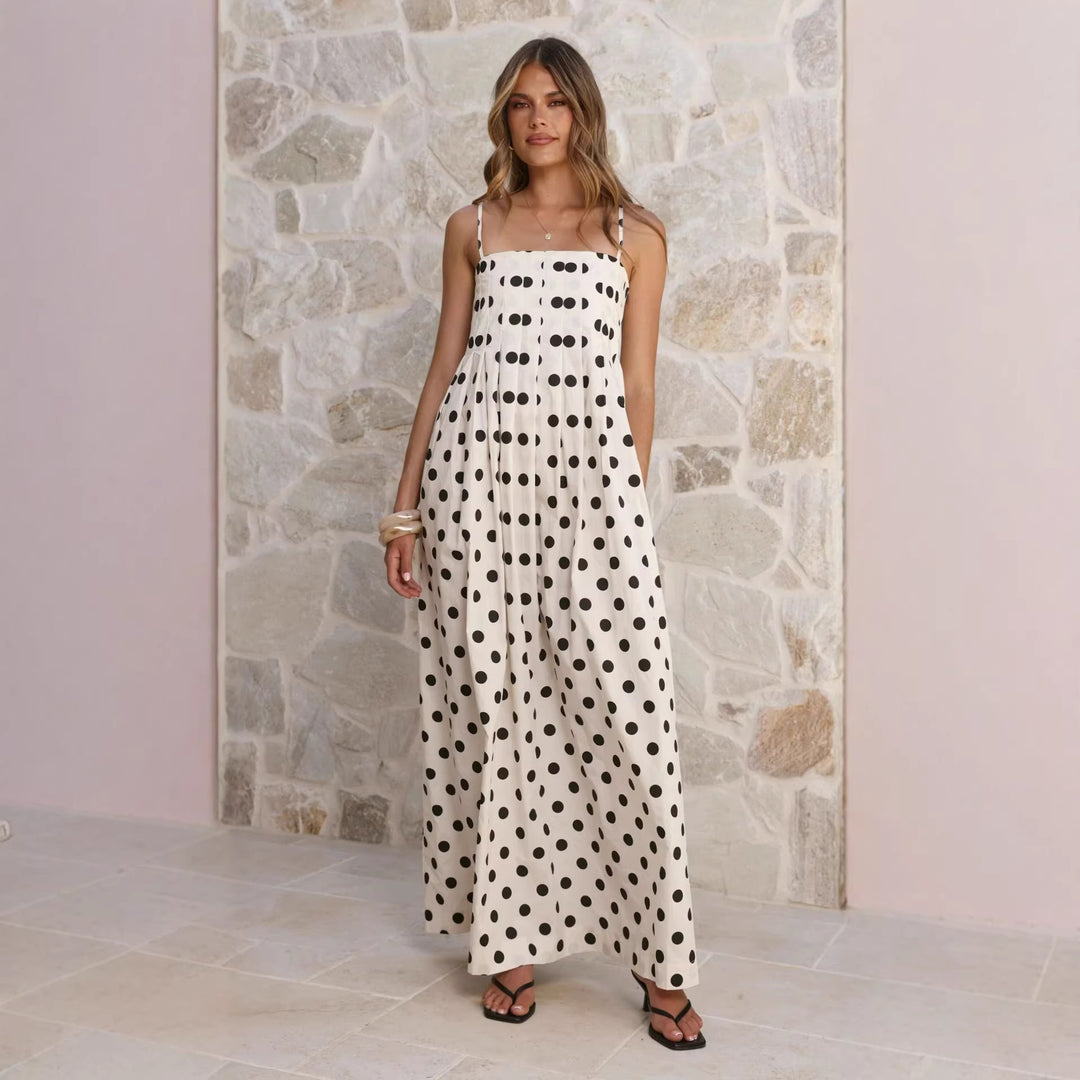 Women’s maxi dress with playful polka dot pattern and off-the-shoulder straps