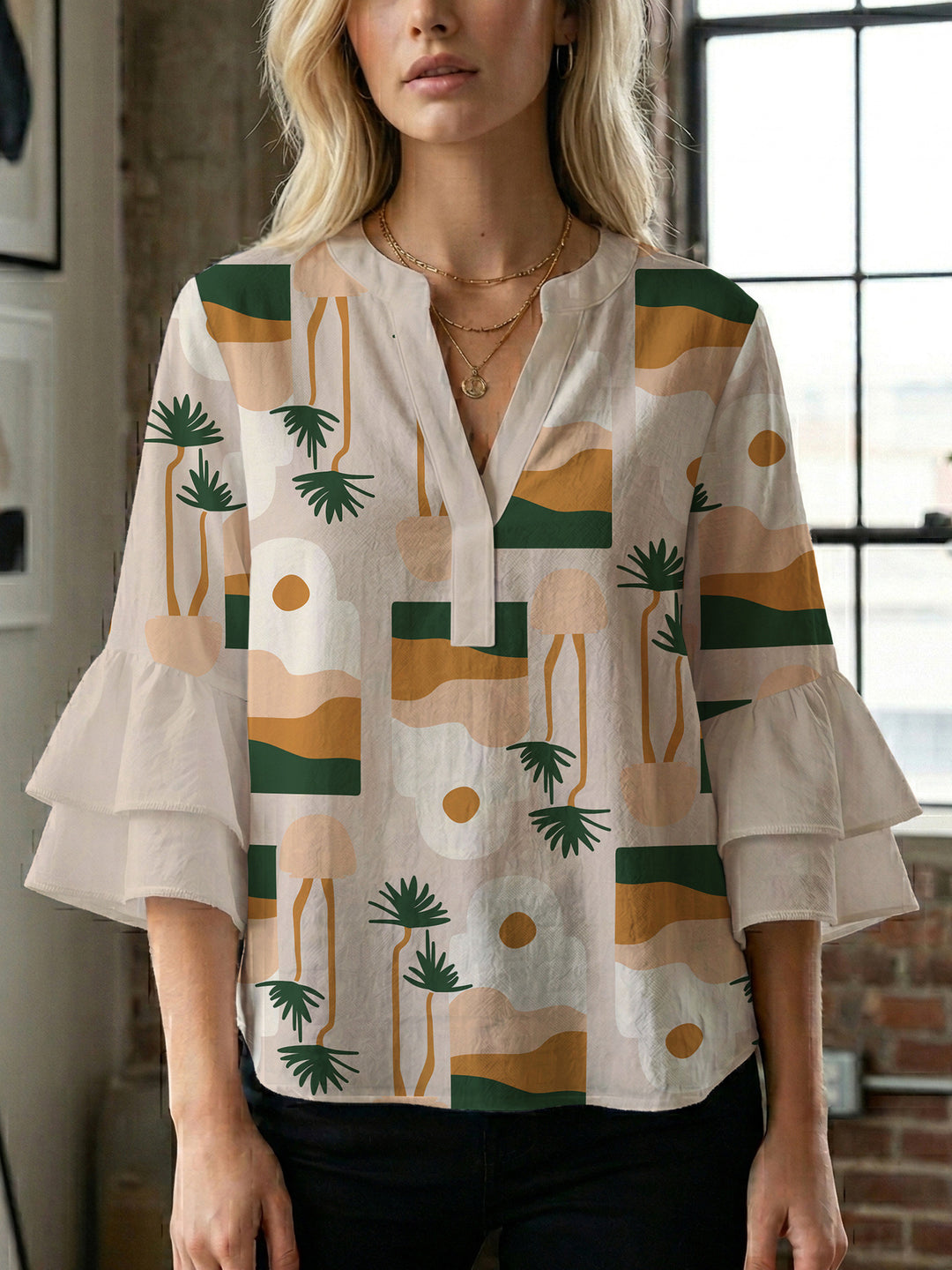 Women's blouse with ruffle details and eye-catching animal print Lisslune