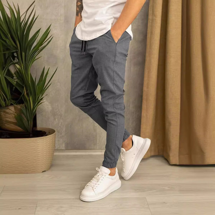 Men's Slim-Fit Jogging Pants with Elastic Waistband and Practical Side Flap Pockets Lisslune