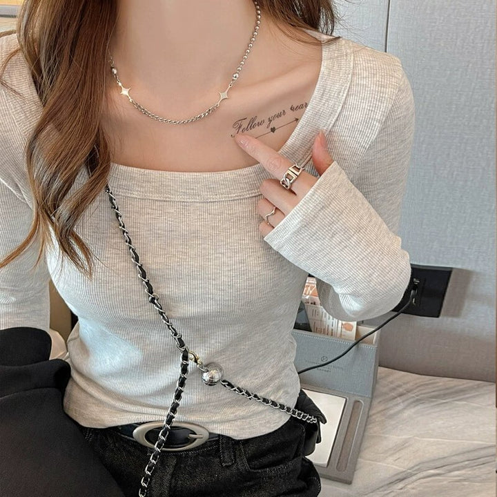 Women’s long sleeve shirt with modern square neckline and fine rib knit