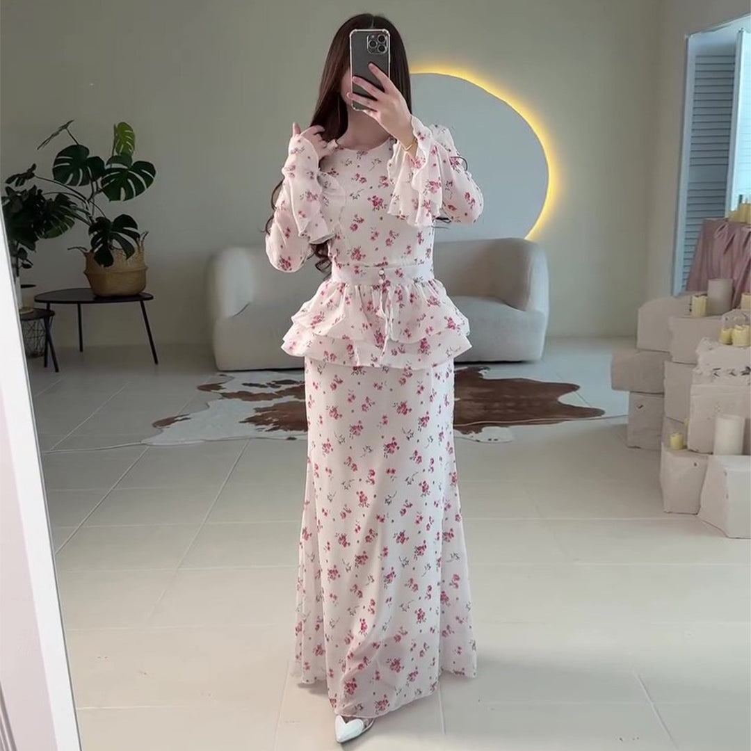 Women's maxi dress with voluminous peplum and floral accents