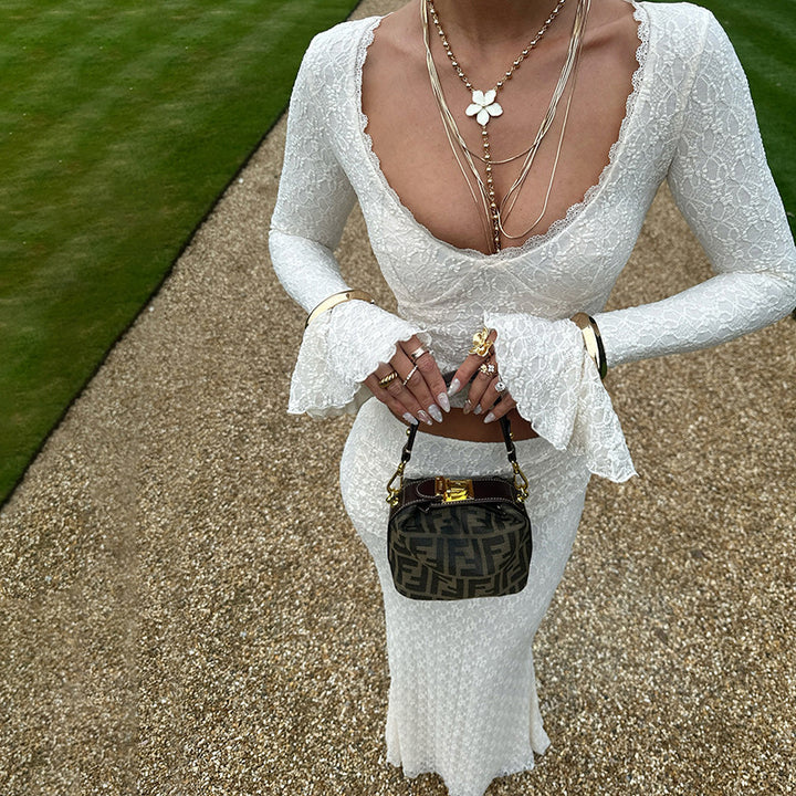 Ladies Elegant Lace Dress with Voluminous Sleeves and Deep V-Neck