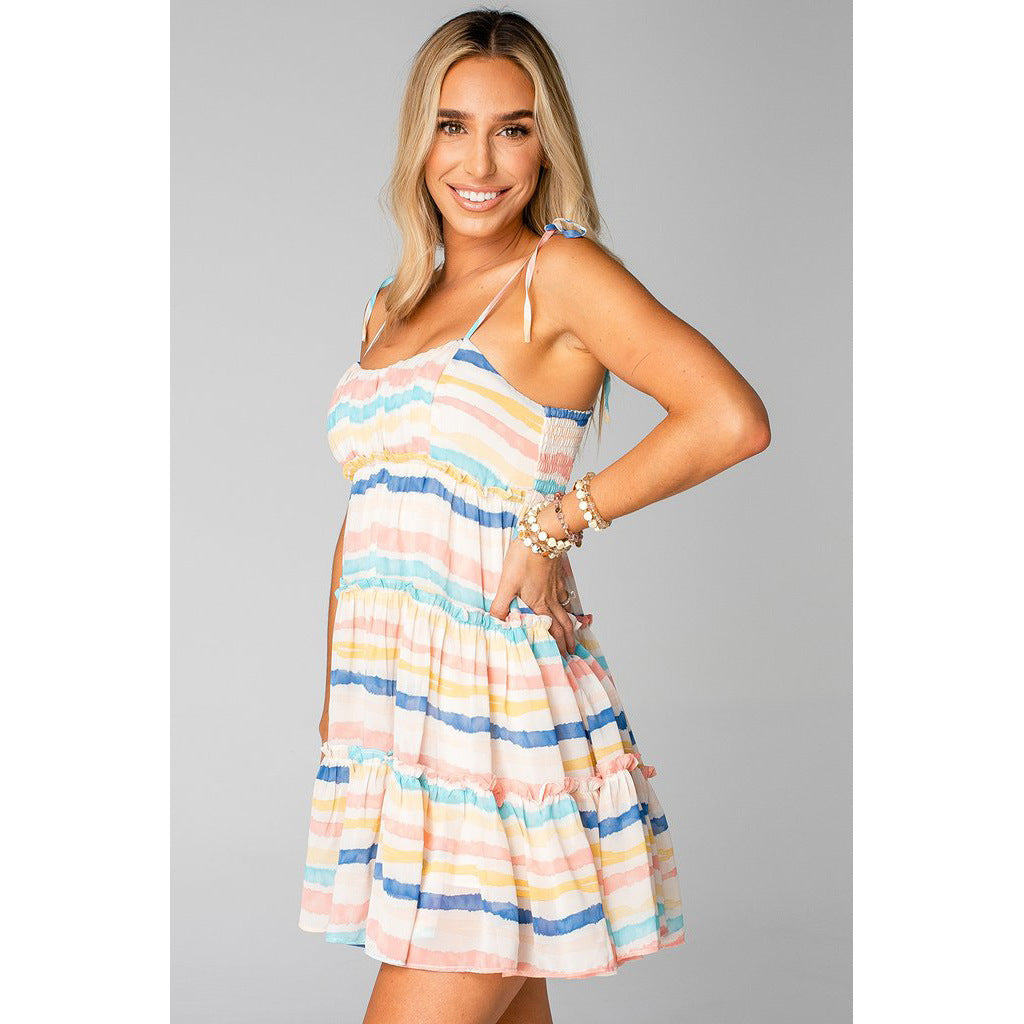 Women's casual dress with playful ruffle details and adjustable straps Lune London
