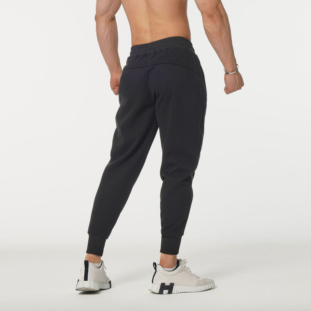 Men's sporty jogging pants with elastic waistband and stylish contrast stripes Lisslune