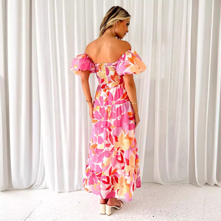 Women's maxi dress with voluminous puff sleeves and floral pattern