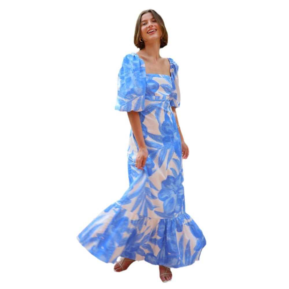 Ladies maxi dress with elegant puff sleeves and floral accents Lune London