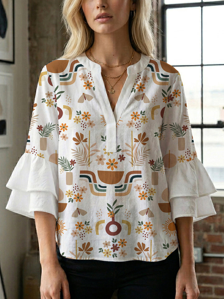 Women's blouse with ruffle details and eye-catching animal print Lisslune
