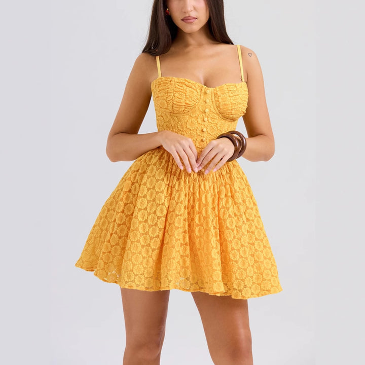 Ladies summery bustier dress with playful ruffles and refined button details