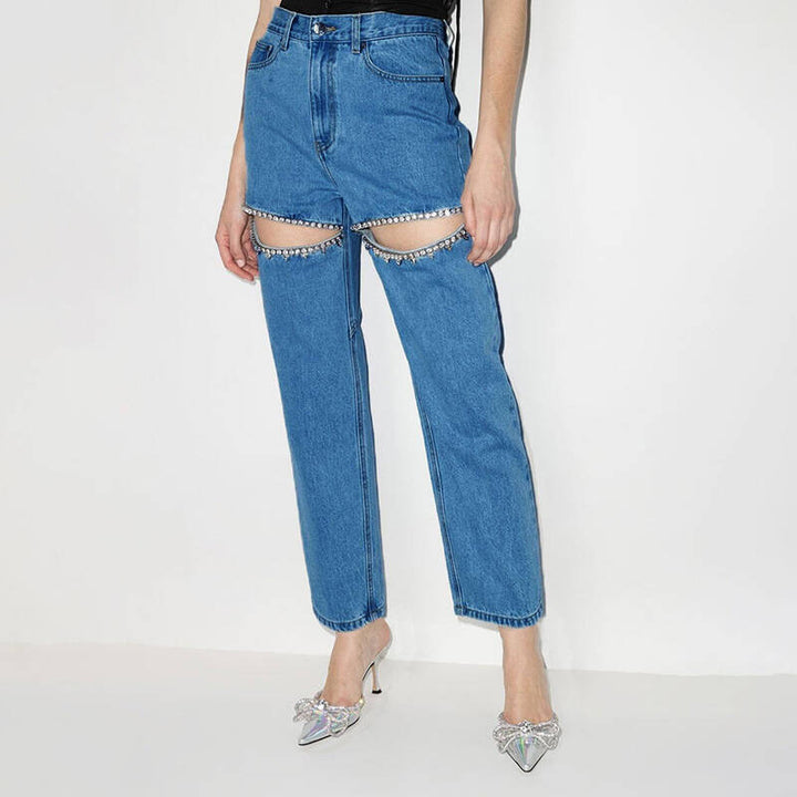 Ladies jeans with an extravagant cut-out design and glittering embellishments