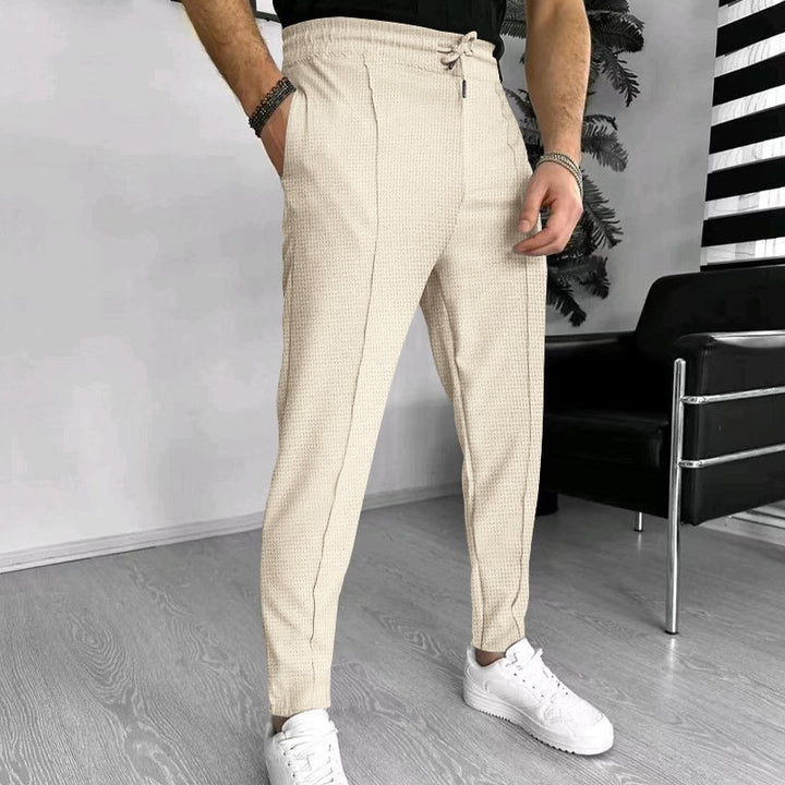 Men's fashionable leisure trousers with elastic waistband and woven pattern Lisslune