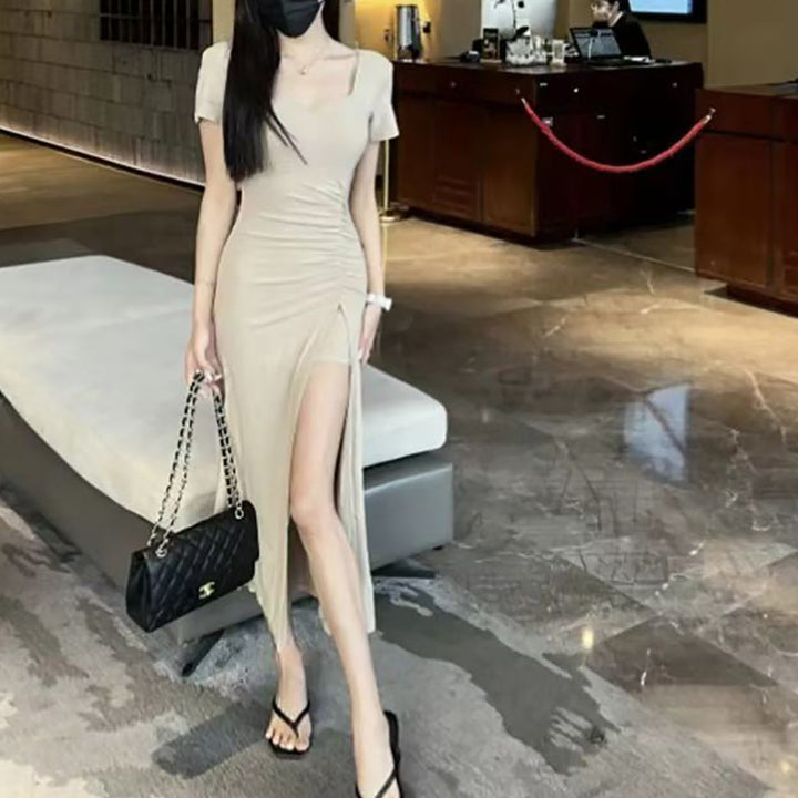 Women's form-fitting long dress with stylish gathering effect and high slit