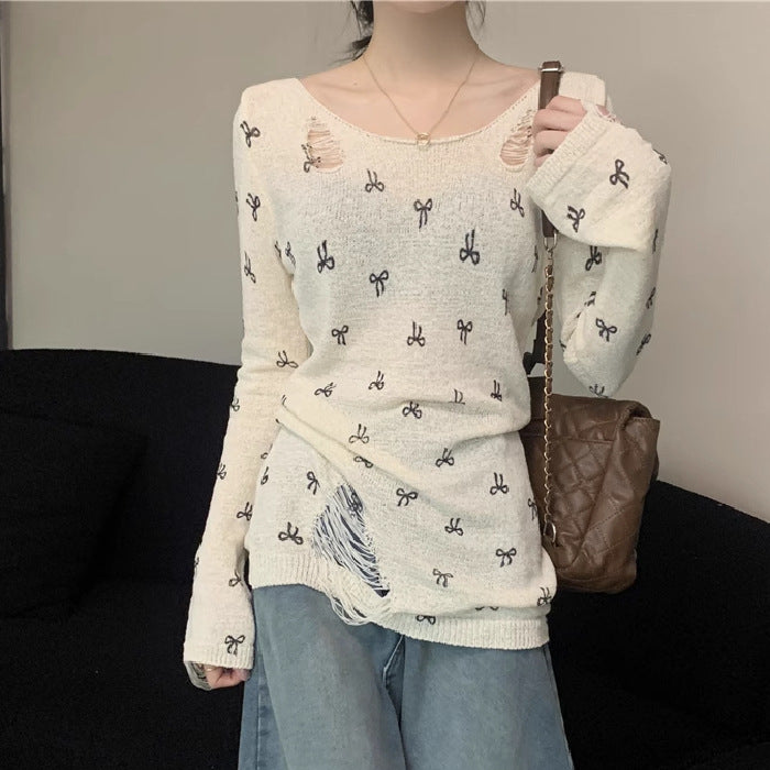 Women's long sleeve shirt with stylish rips and playful motif Lisslune