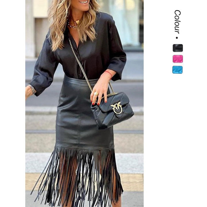 Women's fuchsia fringe skirt made of synthetic leather with a fitted silhouette and swinging design