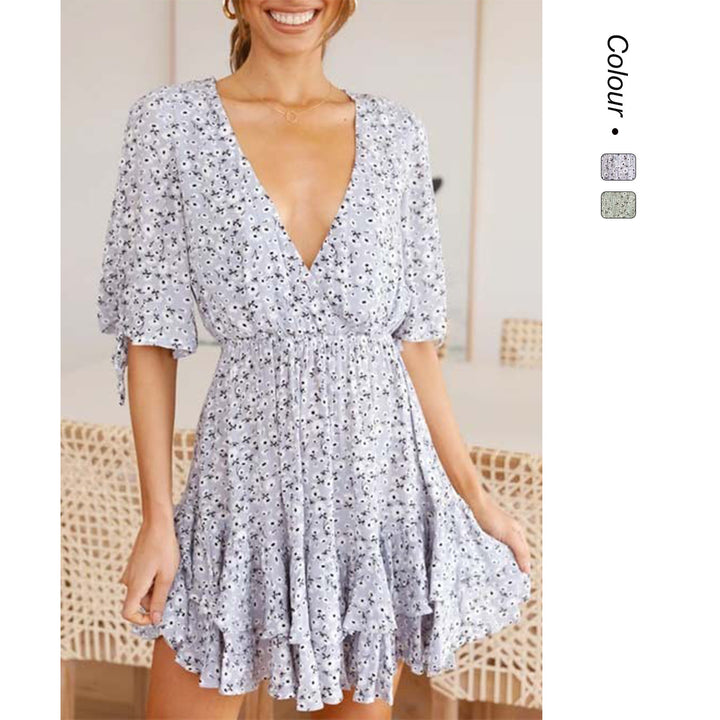Women's mini dress with playful floral print and flowing hem