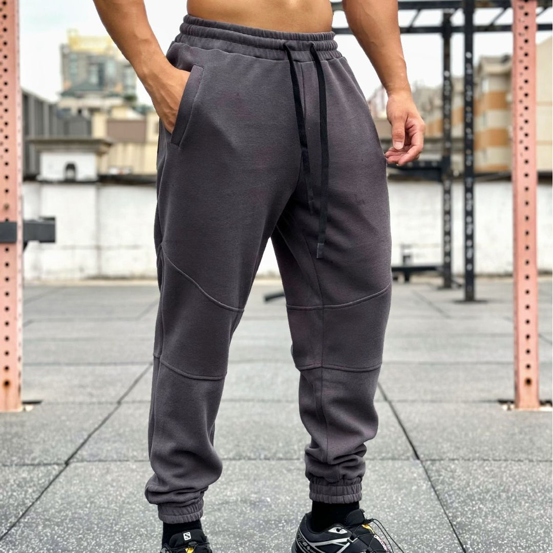 Men's sporty jogging pants with elastic waistband and practical side pockets Lisslune