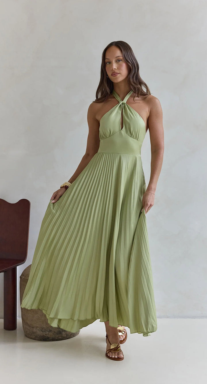 Women's maxi dress with elegant halter design and pleated skirt