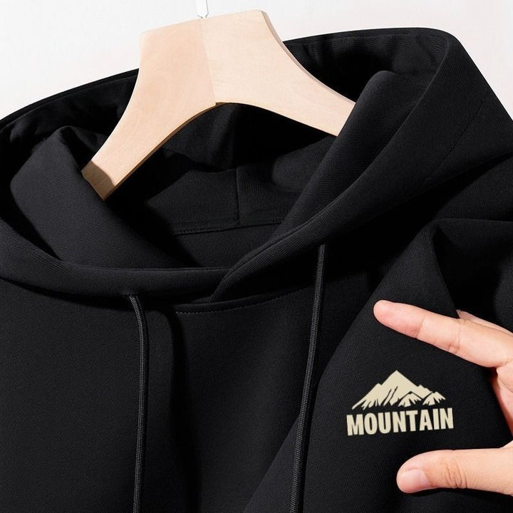 Women's hoodie with modern mountain motif and practical pockets Lisslune