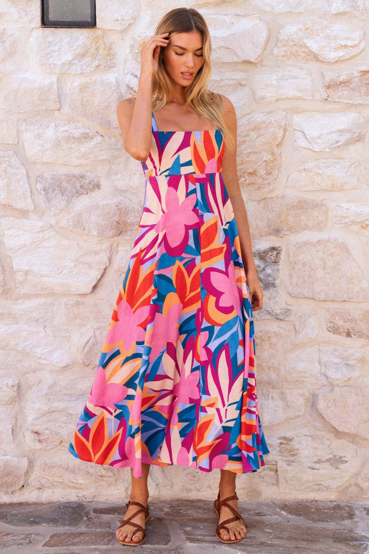 Women's maxi dress with vibrant floral design and flared skirt