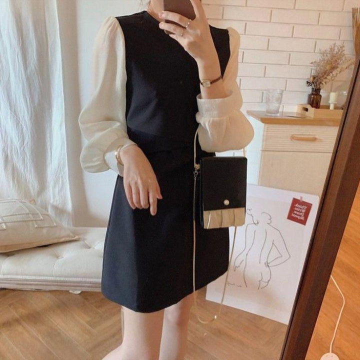 Ladies dress with stylish puff sleeves and elegant waistline