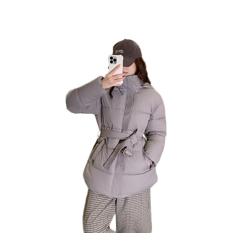 Women's quilted winter jacket with high collar and side pockets
