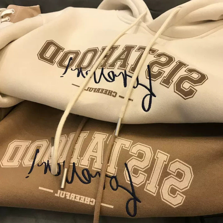 Women's hoodie with creative lettering and casual oversized fit