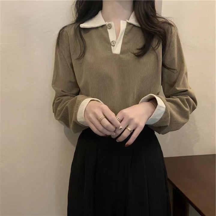 Women’s long-sleeve shirt with structured ribbed look and classic polo collar