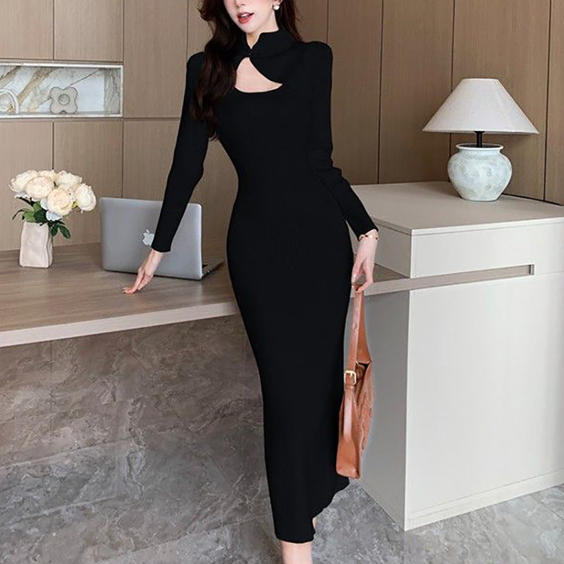 Women's elegant midi dress with asymmetrical cut-out design and textured knit