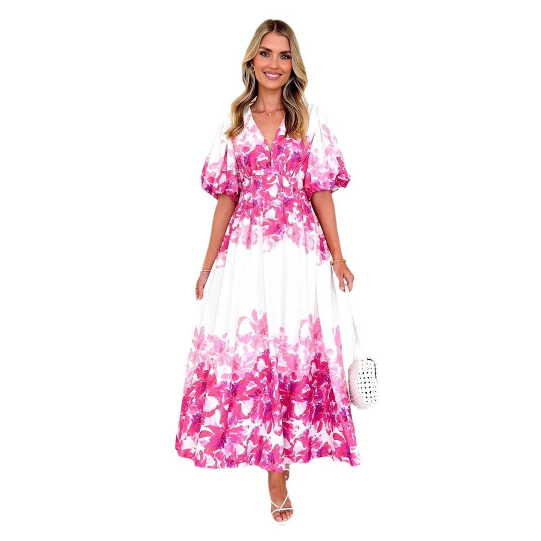 Women's maxi dress with voluminous puff sleeves and flowing cut