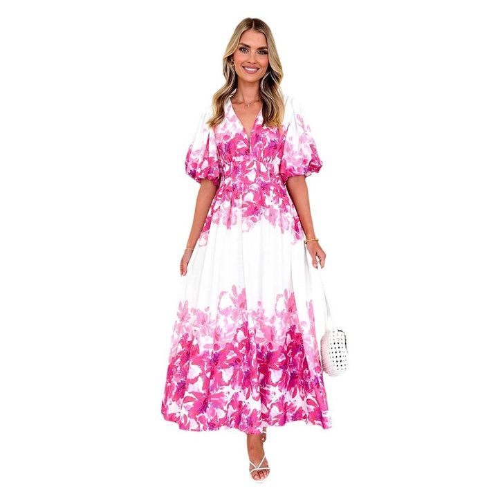 Women's maxi dress with voluminous puff sleeves and flowing cut