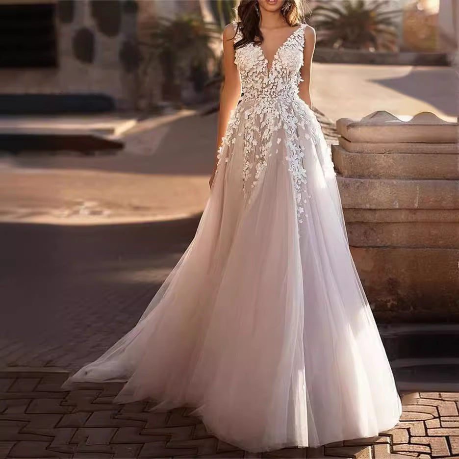 Ladies wedding dress with exquisite floral appliqués and deep V-neck Lisslune