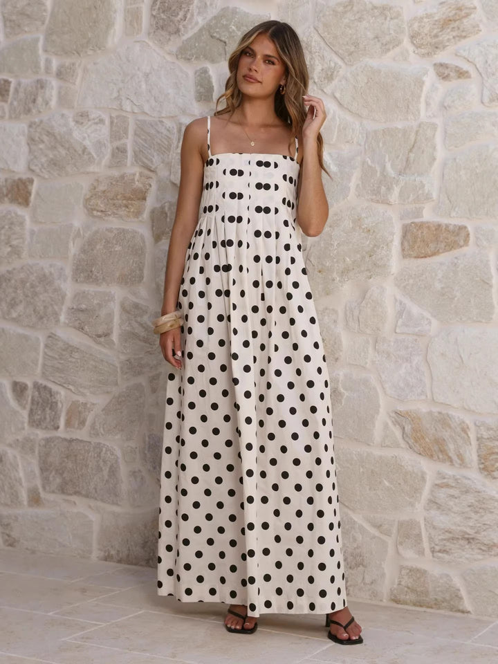 Women’s maxi dress with playful polka dot pattern and off-the-shoulder straps