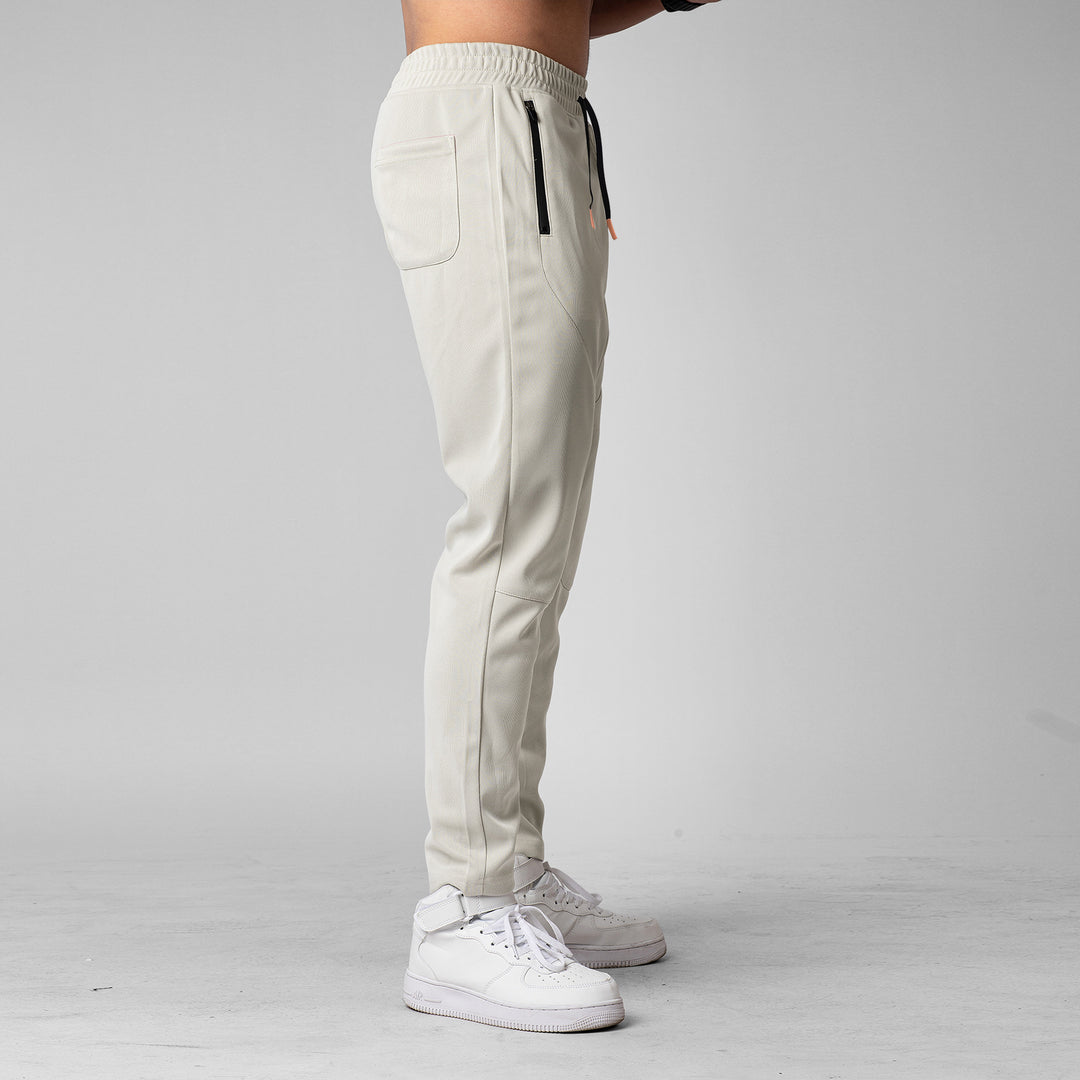 Men's sporty jogging pants with innovative breathable structure and practical zip pockets Lisslune